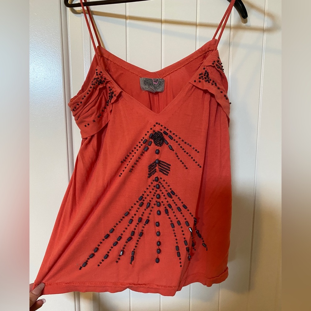 Orange hand beaded tank top.